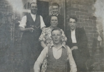 Clare's great-grandparents with family members